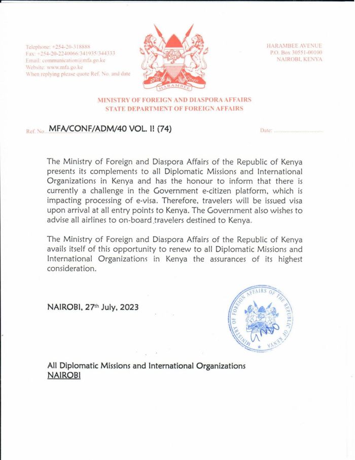 Kenyan immigration officers at airport counter